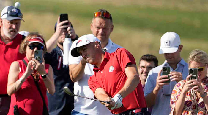 Justin Thomas chips onto the 10th green during a practice round ahead of the 2023 Ryder Cup at the Marco Simone Golf Club in Italy.